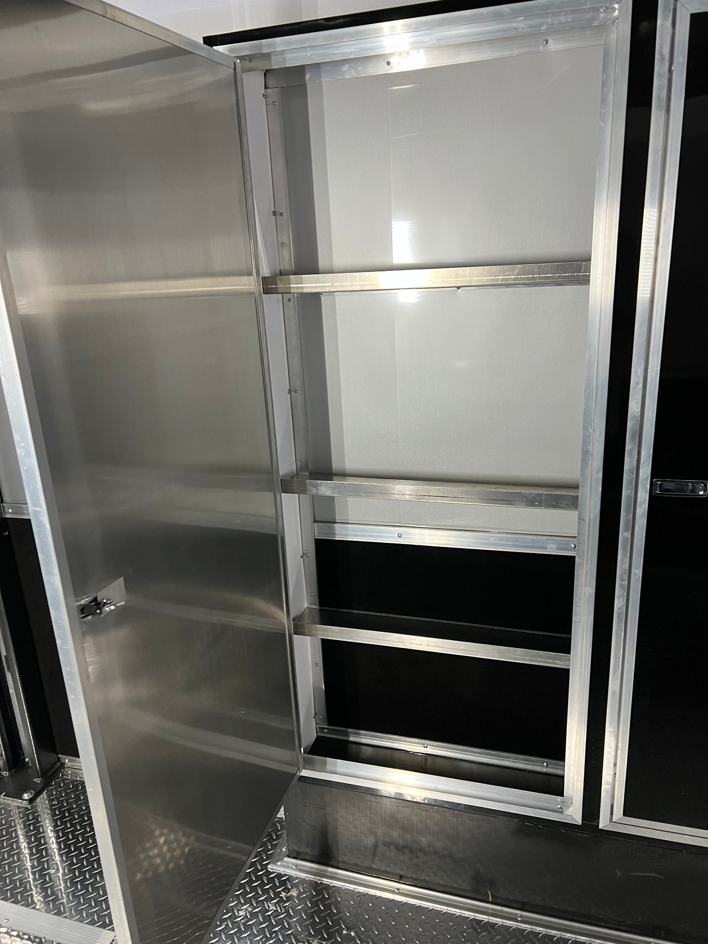 12’ long x 7” deep x 72” high Aluminum Fender Well Cabinet (4-Doors)